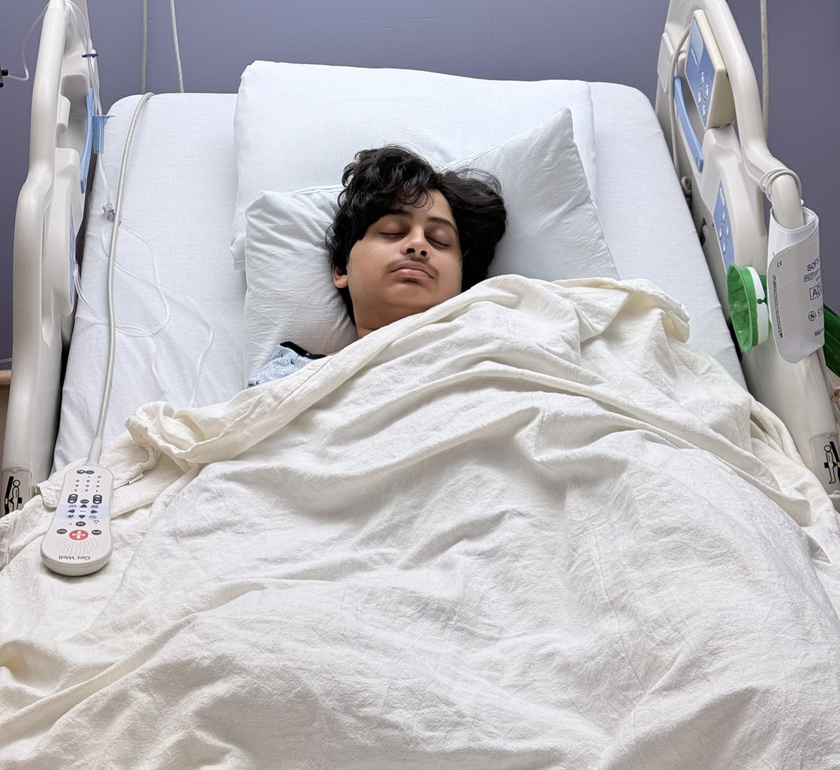 Atharv resting in a hospital bed